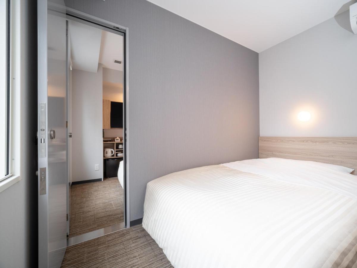 Super Hotel Okayama Station Higashiguchi Екстер'єр фото